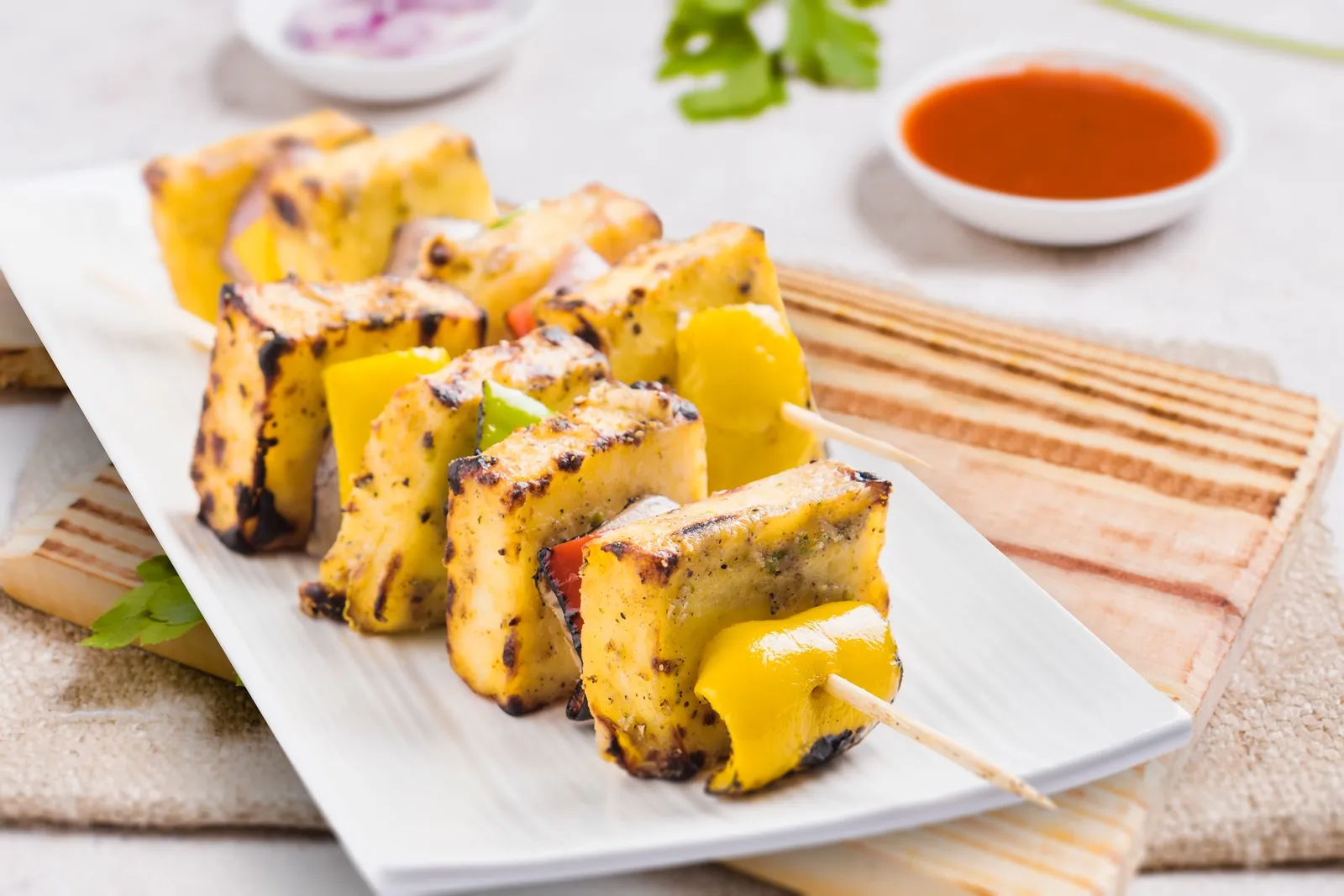 Paneer tikka skewers with mint chutney